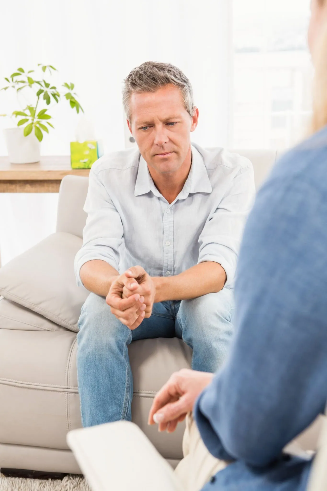 A client in a somatic therapy session in Boulder, Colorado